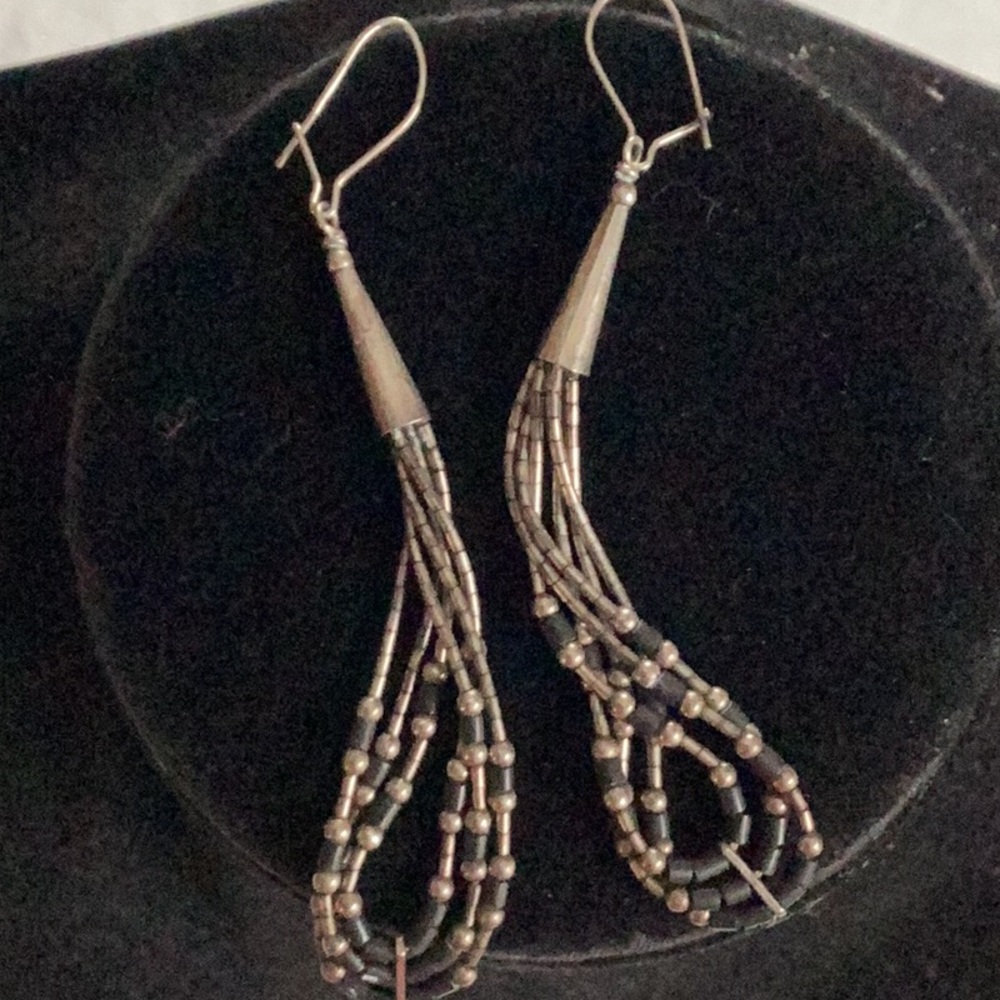 Silver earrings with black beads